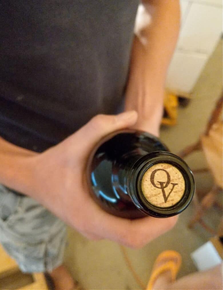 Bottling 2017 Vintage - a bottle of wine showing the OV stamp on the top of the cork.