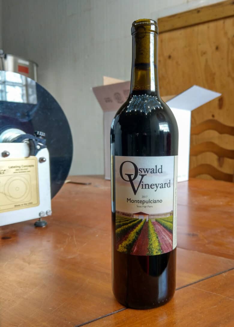 Labeling 2017 Vintage - a labeled bottle of Montepulciano wine,