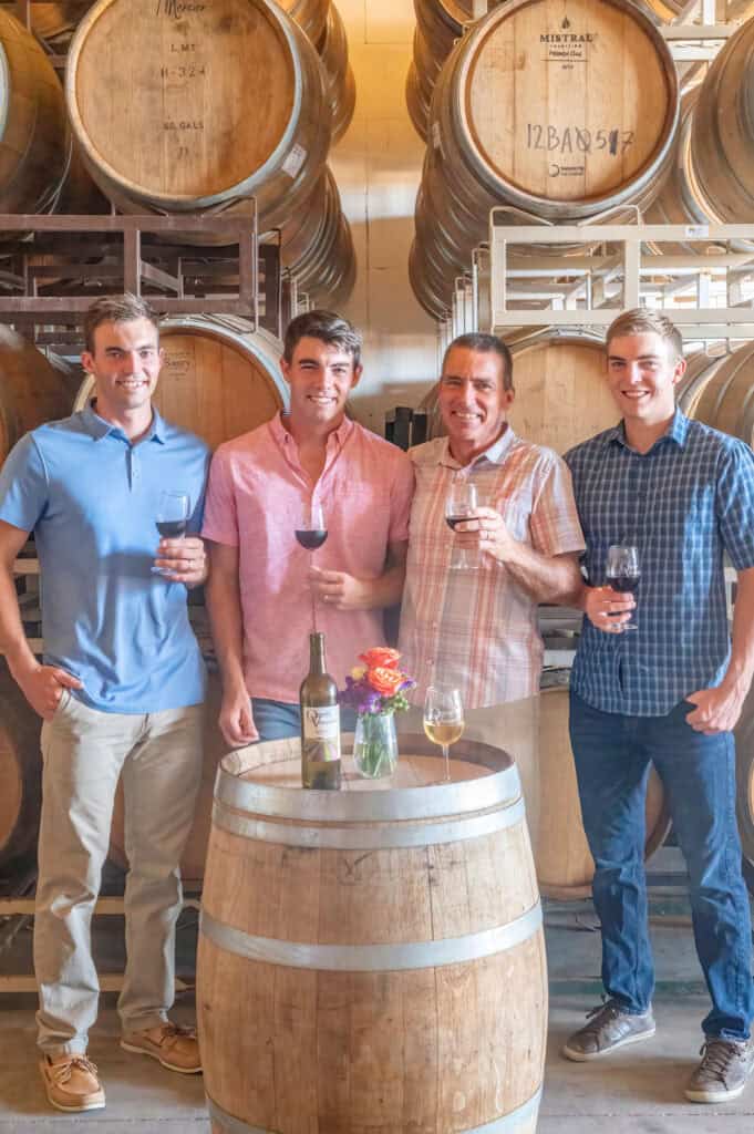 Julian, Christoph, John and Zane Oswald from Oswald Vineyard Family in barrel room